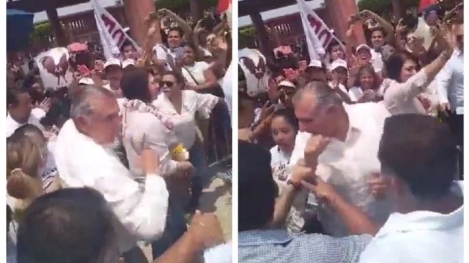 Adán Augusto suelta codazo a una mujer 
